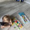 бізі-борд - розвиваюча дошка із шнурівкою, танграмом та магнітною рибалкою