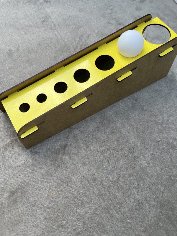 Игра-тренажер на развитие дыхания  “Шарик в отверстие”